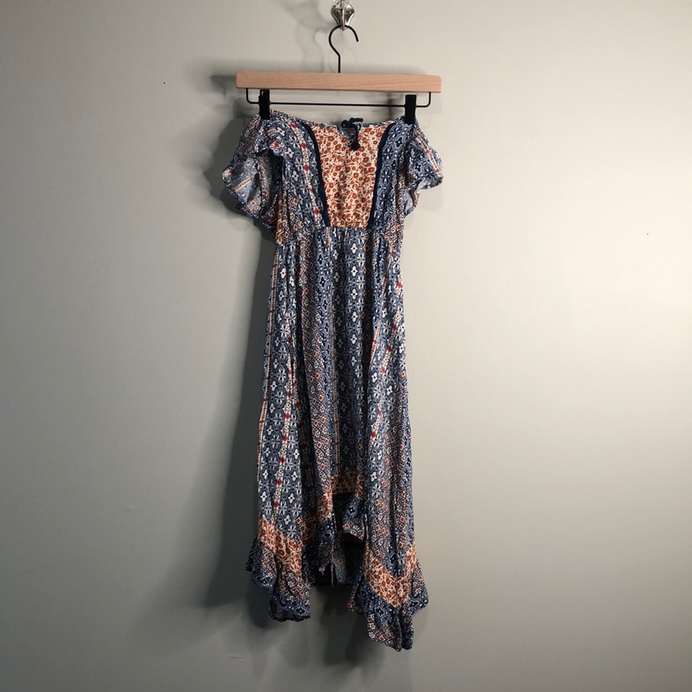 Beautiful ruffled dress with designs